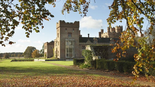 The south and east fronts at Oxburgh Hall, Norfolk, in autumn